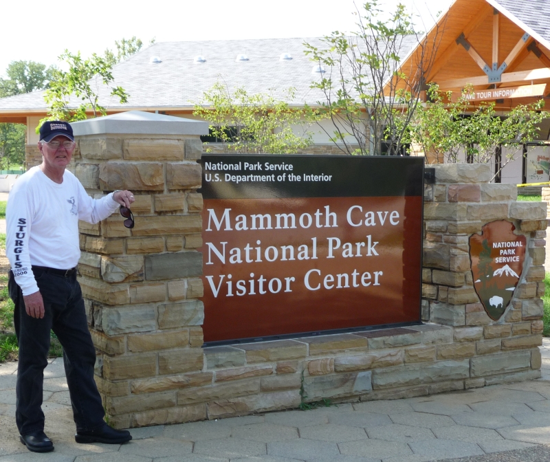 Boyd in front of the Mammoth Cave sign