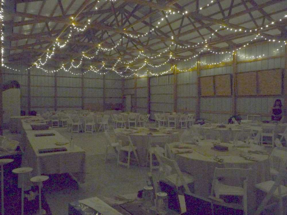 grainy picture of inside the pole barn, lit just by the LEDs